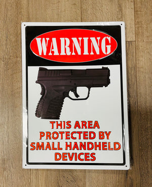 "This Area Protected by Small Hand Held Devices" Metal Novelty Sign